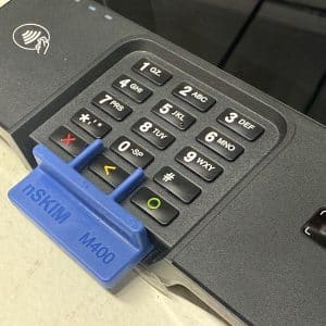 credit card pin pad with blue plastic inside chip slot